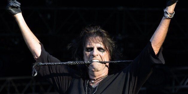 US singer Alice Cooper performs during the Hellfest heavy metal and hard rock music festival Hellfest in Clisson, near Nantes, western France, on June 19, 2015. AFP PHOTO GEORGES GOBET (Photo credit should read GEORGES GOBET/AFP/Getty Images)