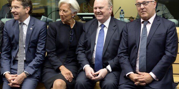 Eurogroup President Jeroen Dijsselbloem (L) IMF (International Monetary fund) Managing Director Christine Lagarde (2-L) Irish Finance Minister Michael Noonan (2-R) and French Finance Minister Michel Sapin look on prior to a Eurogroup meeting held at the Lex building in Brussels, on June 25, 2015. Greek Prime Minister Alexis Tsipras and his country's creditors failed to reach a bailout deal at emergency talks, raising fresh fears that Athens will default on an IMF loan next week. The differen