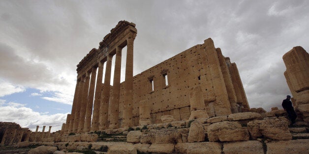 TO GO WITH AFP STORY BY SAMMY KETZA picture taken on March 14, 2014 shows the external courtyard of the sanctuary of Baal in the ancient oasis city of Palmyra, 215 kilometres northeast of Damascus. Syria's fabled desert Greco-Roman oasis of Palmyra saw its last tourist in September 2011, six months after the uprising began. Its most recent visitors are violence and looting. AFP PHOTO/JOSEPH EID (Photo credit should read JOSEPH EID/AFP/Getty Images)