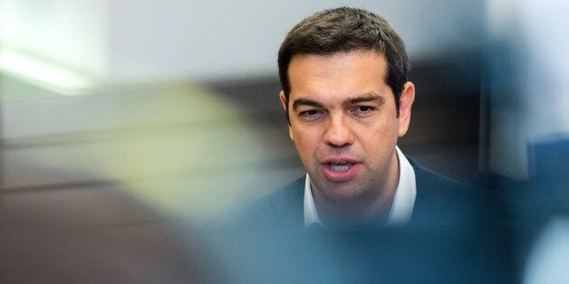 Greek Prime Minister Alexis Tsipras speaks during a media conference at an EU summit in Brussels on Monday, June 22, 2015. Eurozone finance ministers were cautiously optimistic on Monday that a deal on Greece's bailout was finally within reach this week, amid fears the country might otherwise default on its debts and fall out of the euro. (AP Photo/Geert Vanden Wijngaert)