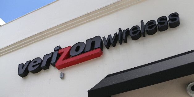 CORAL GABLES, FL - MAY 12: A Verizon wireless sign is seen on the outside of a store on May 12, 2015 in Coral Gables, Florida. Today, Verizon Communications announced an agreement to buy AOL for $4.4 billion. (Photo by Joe Raedle/Getty Images)