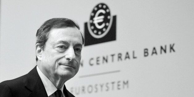 FRANKFURT AM MAIN, GERMANY - DECEMBER 04: (EDITORS NOTE: This image was processed using digital filters.) Mario Draghi, President of the European Central Bank pictured during his first press conference following the monthly ECB board meeting in the new ECB headquaters on December 4, 2014 in Frankfurt am Main, Germany. (Photo by Thomas Lohnes/Getty Images)