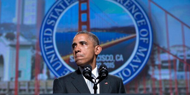 In this June 19, 2015, photo, President Barack Obama pauses as he speaks about gun violence at the Annual Meeting of the U.S. Conference of Mayors in San Francisco. Conceding that congressional action was unlikely soon, President Barack Obama said lawmakers will tighten federal firearms restrictions when they believe the public is demanding it.