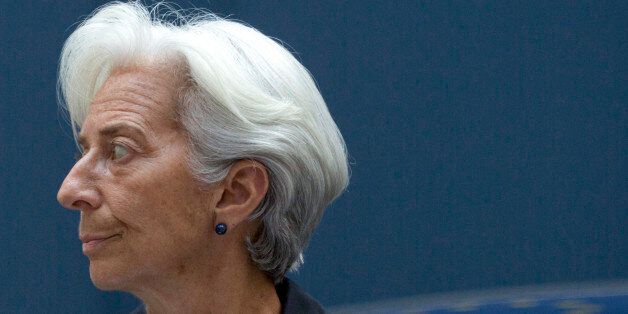 Managing Director of the International Monetary Fund Christine Lagarde arrives for a meeting of eurogroup finance ministers in Brussels on Saturday, June 27, 2015. Anxiety over Greece's future swelled on Saturday after Prime Minister Alexis Tsipras' call to have the people vote on a proposed bailout deal which could increase the risk that the country might fall out of the euro. (AP Photo/Virginia Mayo)