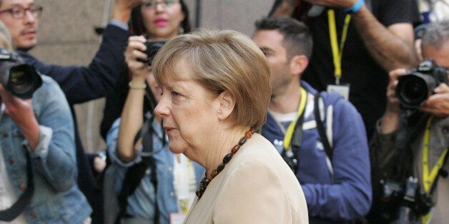 German Chancellor Angela Merkel arrives for the EU-CELAC summit in Brussels on Thursday, June 11, 2015. Greek Prime Minister Alexis Tsipras will continue his diplomatic offensive on Thursday to try to convince European creditors to pay out the bailout loans the country needs to avoid default. (AP Photo/Francois Walschaerts)