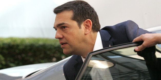 Greek Prime Minister Alexis Tsipras arrives for the EU-CELAC summit in Brussels on Thursday, June 11, 2015. Greek Prime Minister Alexis Tsipras will continue his diplomatic offensive on Thursday to try to convince European creditors to pay out the bailout loans the country needs to avoid default. (AP Photo/Francois Walschaerts)