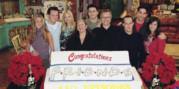 FRIENDS - 'The One With The Engagement Picture' -- Episode 5 -- Aired 11/2/2000 -- Pictured (l-r): Jennifer Aniston, Matthew Perry, Lisa Kudrow, executive producer Marta Kauffman, Matt LeBlanc, executive producer Kevin S. Bright, executive producer David Crane, David Schwimmer, Courteney Cox -- NBCU Photo Bank