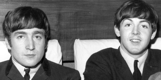 1st November 1963: Two members of Liverpudlian pop group The Beatles, John Lennon (1940 - 1980), singer and guitarist, left, and Paul McCartney, singer and bass guitarist. (Photo by Fox Photos/Getty Images)
