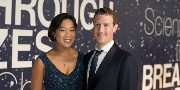 Priscilla Chan and Mark Zuckerberg arrive at the 2nd Annual Breakthrough Prize Award Ceremony at the NASA Ames Research Center on Sunday, Nov. 9, 2014 in Mountain View, California. (Photo by [Peter Barreras]/Invision/AP)