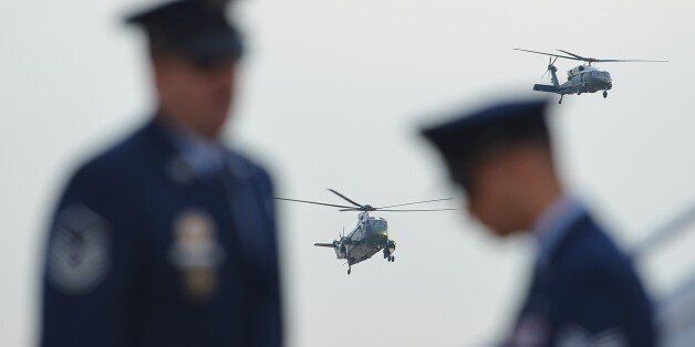 Marine One, carrying US President Barack Obama, approaches a landing at Andrews Air Force Base in Maryland on October 24, 2012. President Obama set off Wednesday on an eight state, 7,660 mile, 40-hour tour, in a show of confidence and commitment in battlegrounds that will decide the election. Thirteen days before he asks voters for a second term, Obama's through-the-night, coast-to-coast trip will take in six of the most contested swing states in his toss-up race with Republican Mitt Romney. The struggle in Iowa, Colorado, Nevada, Florida, Virginia and Ohio will decide which of the rivals masses the 270 electoral votes needed to win the White House. AFP PHOTO/Mandel NGAN (Photo credit should read MANDEL NGAN/AFP/Getty Images)