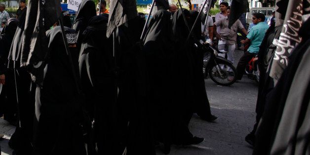 Protest held on 6 September 2014 calling for Islamic Shariah to be implemented in Maldives. Protestors used their democratic right to call to end democracy & claim that its a religion among other things.