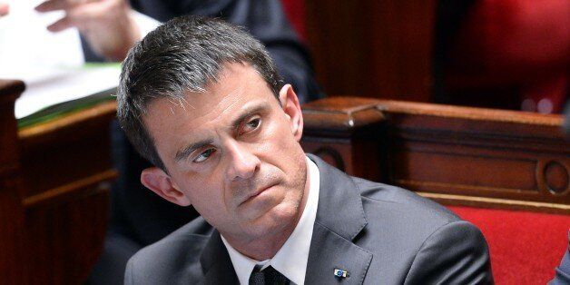 French Prime Minister Manuel Valls listens during a session of questions to the government at the French National Assembly on June 10, 2015, in Paris. AFP PHOTO / BERTRAND GUAY (Photo credit should read BERTRAND GUAY/AFP/Getty Images)