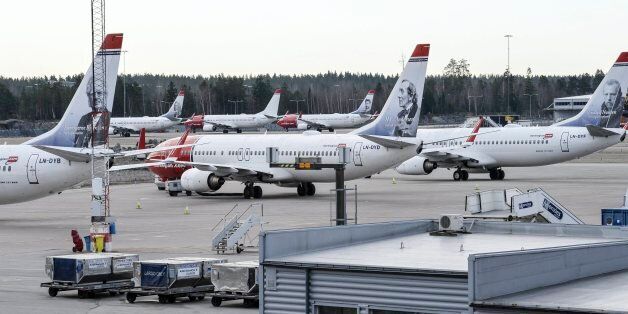 Parked Boeing 737-800 aircrafts belonging to budget carrier Norwegian seen at at Stockholm Arlanda Airport Thursday March 5, 2015. 650 pilots employed by Norwegian Air Norway (NAN) are on strike grounding flights in Norway, Sweden and Denmark. (AP Photo/Johan Nilsson / TT) SWEDEN OUT
