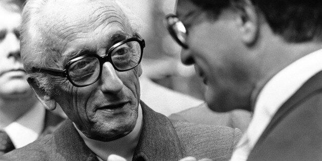 Marine explorer Jacques-Yves Cousteau an honorary degree recipient at Harvard University, has a discussion in Cambridge on Thursday, June 7, 1979 with Elliot L. Richardson former secretary U.S., Dept. Health, Education and Welfare, during Harvard commencement in Cambridge, Mass. (AP Photo)