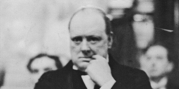 British statesman Winston Churchill (1874 - 1965) experiences a nail-biting moment during a meeting of the Great Indian Empire Society at the Cannon Street Hotel, 1930. (Photo by Hulton Archive/Getty Images)