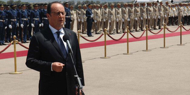 French President Francois Hollande, delivers a speech upon his arrival at Houari Boumediene airport in Algiers, Algeria, Monday, June 15, 2015. Hollande made a fleeting visit to Algiers for a few hours to meet his Algerian counterpart Abdelaziz Bouteflika. (AP Photo/Sidali Djarboub)