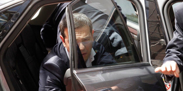 Greek Prime Minister Alexis Tsipras arrives for the EU-CELAC summit in Brussels on Wednesday, June 10, 2015. European leaders and their Latin America and the Caribbean counterparts meet on a biannual basis in an effort to maintain international and economic ties. (AP Photo/Francois Walschaerts)