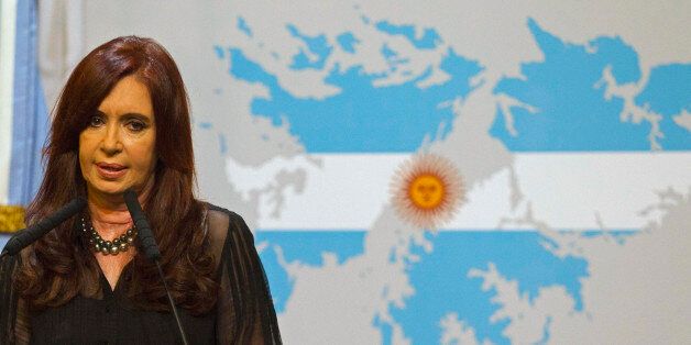Argentina's President Cristina Fernandez speaks during a national address while standing in front of a Falklands Islands' map at Government Palace in Buenos Aires, Argentina, Tuesday Feb. 7, 2012. Fernandez says she will formally complain to the U.N. Security Council about Britain sending one of its most modern warships to the Falkland Islands and accused British Prime Minister David Cameron of militarizing their long dispute over the islands in the South Atlantic. (AP Photo/Eduardo Di Baia)