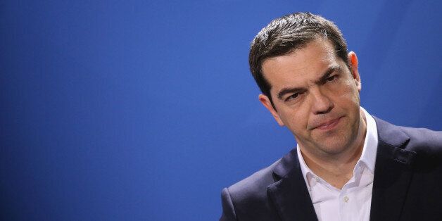 BERLIN, GERMANY - MARCH 23: Greek Prime Minister Alexis Tsipras speaks to the media with German Chancellor Angela Merkel (not pictured) following talks at the Chancellery on March 23, 2015 in Berlin, Germany. The two leaders are meeting as relations between the Tsipras government and Germany have soured amidst contrary views between the two countries on how Greece can best work itself out of its current economic morass. (Photo by Sean Gallup/Getty Images)