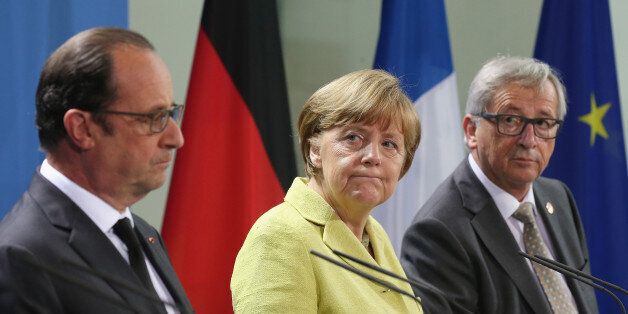 BERLIN, GERMANY - JUNE 01: German Chancellor Angela Merkel, French President Francois Hollande (L) and European Union Commission President Jean-Claude Juncker give statements to the media prior to talks at the Chancellery on June 1, 2015 in Berlin, Germany. The three leaders are meeting to discuss European digital initiatives as well as the ongoing Greek financial crisis that has become more urgent as a possible bankruptcy by Greece is looming. (Photo by Sean Gallup/Getty Images)