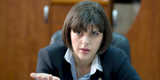 In a picture taken on Wednesday, April 8, 2015 Laura Codruta Kovesi the chief prosecutor of Romania's anti-corruption authority, the DNA, speaks during an interview with the Associated Press in Bucharest, Romania. Under communism, the justice system was a manâs domain; in the 1990s, with the advent of democracy and capitalism in Romania, men left poorly paying state prosecutor and magistrate jobs and the result is that 60 percent of Romaniaâs prosecutors and judges today are women.(AP Photo/Vadim Ghirda)