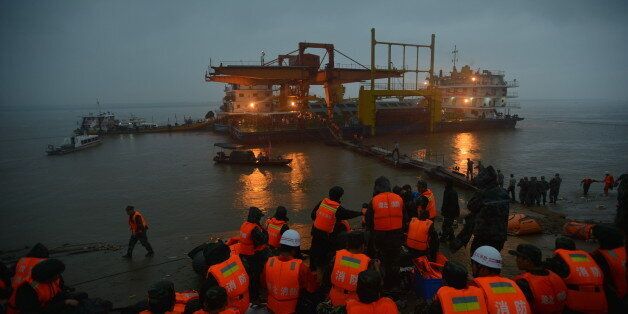 JINGZHOU, CHINA - JUNE 02: (CHINA OUT) Rescuers search for survivors from the capsized ship Dongfangzhixing in the Yangtze River on June 2, 2015 in Jingzhou, China. A passenger ship named Dongfangzhixing (Eastern Star) carrying 458 people, including 406 Chinese passengers, 5 travel agency workers and 47 crew members aboard, according to the administration, sank at around 9:28 p.m. on Monday in the Jianli (Hubei Province) section of the Yangtze River. (Photo by ChinaFotoPress/ChinaFotoPress via Getty Images)