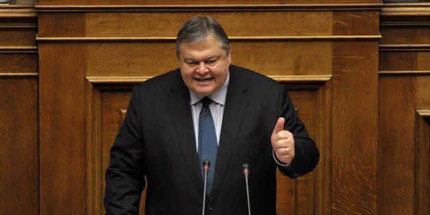 Leader of the socialist party, Evangelos Venizelos speaks at the Greek parliament in Athens on November 11, 2012 during the discussion over the 2013 budget. Greece's government faces another crucial test when lawmakers vote on the 2013 budget just days after parliament narrowly adopted an austerity package aimed at securing a new slice of international aid for the debt-crippled country. AFP PHOTO / LOUISA GOULIAMAKI (Photo credit should read LOUISA GOULIAMAKI/AFP/Getty Images)