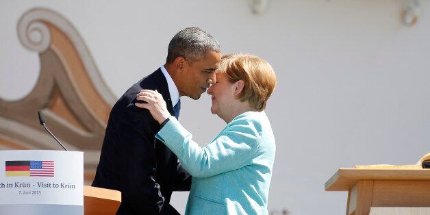 KRUEN, GERMANY - JUNE 07: U.S. President Barack Obama and German Chancellor Angela Merkel greet each other at the summit of G7 nations on June 7, 2015 in Kruen, Germany. In the course of the two-day summit G7 leaders are scheduled to discuss global economic and security issues, as well as pressing global health-related issues, including antibiotics-resistant bacteria and Ebola. Several thousand protesters have announced they will seek to march towards Schloss Elmau and at least 17,000 police are on hand to provide security. (Photo by Goran Gajanin - Pool/Getty Images)