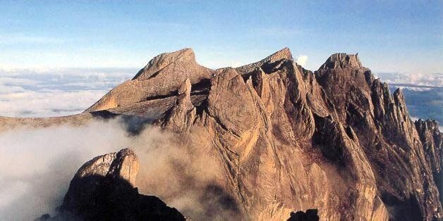 KOTA KINABALU, MALAYSIA: This undated photo shows Mount Kinabalu, South East Asia's highest peak, in East Malaysia's state of Sabah. A Malaysian rescue team has found signs that 17-year-old British girl Ellie James who got lost on Mount Kinabalu for six days may still be alive. Ellie, on holiday from Cornwall, England became separated from her family August 16 2001 while descending the 4,101 metre (13,454 feet) Mount Kinabalu in bad weather. She wandered off with her 15-year-old brother Henry,