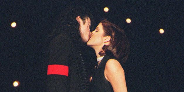 (FILES): This September 8, 1994 file photo shows US pop star Michael Jackson and his then wife Lisa-Marie Presley kissing on the stage of Radio City Music Hall in New York where they attended the MTV Video Music Awards. Jackson died on June 25, 2009 after suffering a cardiac arrest, multiple US media outlets reported, sending shockwaves around the entertainment world. AFP PHOTO / Files (Photo credit should read -/AFP/Getty Images)