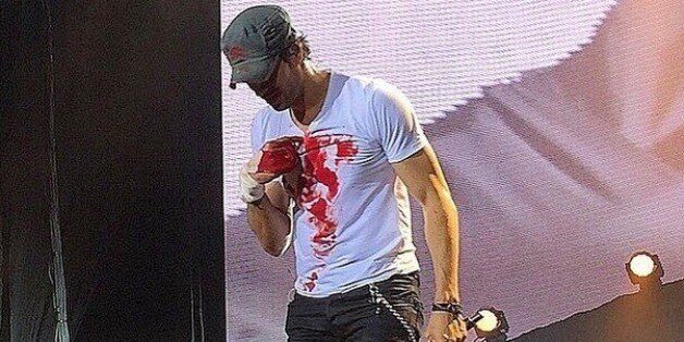 ROSEMONT, IL - FEBRUARY 20: Enrique Iglesias performs onstage at Allstate Arena on February 20, 2015 in Rosemont, Illinois. (Photo by Daniel Boczarski/Getty Images)