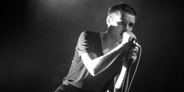 LOS ANGELES, CA - JULY 23: (EDITOR'S NOTE: Image has been converted to black and white) Singer Jehnny Beth of Savages performs on stage at El Rey Theatre on July 23, 2013 in Los Angeles, California. (Photo by Mike Windle/Getty Images)