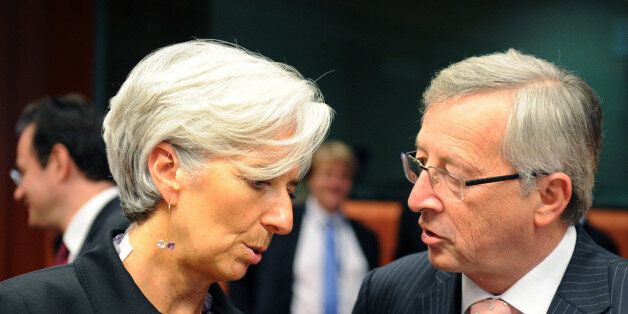 French Finance Minister Christine Lagarde (L) and Luxembourg Prime Minister and Eurogroup head Jean-Claude Juncker talk before a Eurogroup Council meeting on June 14, 2011 at EU headquarters in Brussels. Eurozone finance ministers are meeting in Brussels bidding to resolve a damaging row over the extent to which banks and other private investors can be forced to contribute to a second Greece bailout. German Finance Minister Wolfgang Schaeuble said on June 14 that Berlin was ready to give Greece
