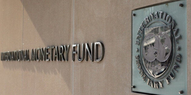 (FILES): This April 5, 2007 file photo shows the International Monetary Fund logo at IMF headquarters on Pennsylvania Avenue in Washington, DC. The IMF announced November 2, 2009 the sale of 200 tonnes of gold to India's central bank, nearly half the amount targeted for sale over the coming years to shore up IMF finances. The total sales proceeds are equivalent to 6.7 billion dollars, the IMF said. AFP PHOTO / Files / TIM SLOAN (Photo credit should read TIM SLOAN/AFP/Getty Images)