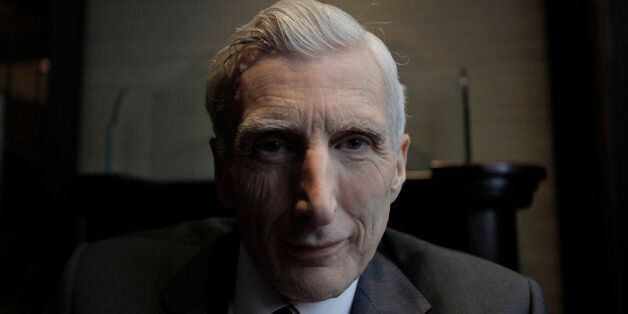 British astrophysicist Martin Rees, poses in central London,Tuesday April 5, 2011. Rees known for his theories on the origin and the destiny of the universe has been honored with one of the world's leading religion prizes. Martin Rees, a 68-year-old expert on the extreme physics of black holes and the Big Bang, is the recipient of the 2011 Templeton Prize, the John Templeton Foundation announced Wednesday April 6, 2011 . The 1 million pound ($1.6 million) award is among the world's most lucra