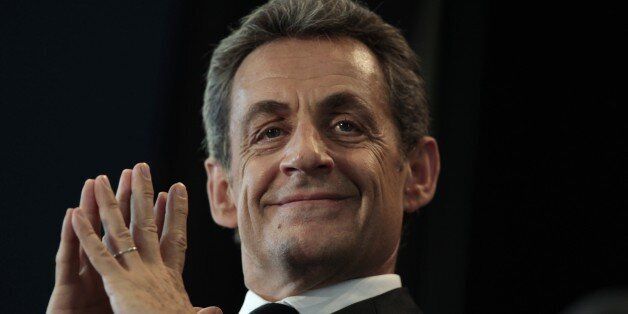 The president of the French right-wing UMP opposition party, Nicolas Sarkozy is pictured during a meeting on May 26, 2015 in Le Havre, northwestern France. AFP PHOTO / CHARLY TRIBALLEAU (Photo credit should read CHARLY TRIBALLEAU/AFP/Getty Images)