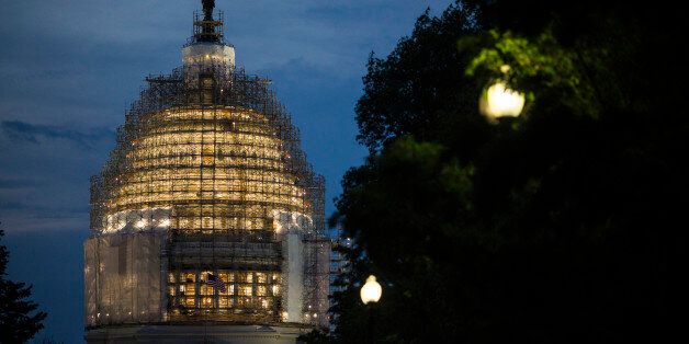 WASHINGTON, DC - MAY 31: The U.S. Capitol is illuminated at dusk, May 31, 2015 in Washington, DC. The National Security Agency's authority to collect bulk telephone data is set to expire June 1, unless the Senate can come to an agreement to extend the surveillance programs. (Photo by Drew Angerer/Getty Images)