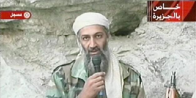 AFGHANISTAN:Saudi-born alleged terror mastermind Osama bin Laden is seen in this video footage recorded 'very recently' at an undisclosed location in Afghanistan aired by the Qatar-based satelite TV station al-Jazeera 07 October 2001. Retaliatory strikes against Afghanistan began 07 October with US and British forces bombing terrorist camps, air bases and air defense installations in the first stage of its campaign against the Taliban regime for sheltering bin Laden, who is the 'prime suspect' in the 11 September attacks in the US. Al-Jazeera reported that the video was shot to be broadcast after the first US bombings. AFP PHOTO/AL-JAZEERA (Photo credit should read AFP/Getty Images)