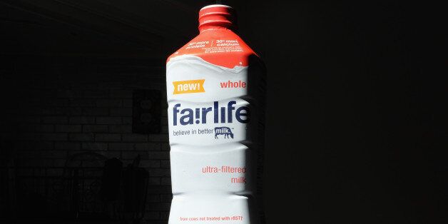 MIAMI, FL - FEBRUARY 04: In this photo illustration, a container of Coca-Cola Companies new Fairlife milk is seen on February 4, 2015 in Miami, Florida. The company announced it will be selling the milk which they say is specially cold-filtered so that it has 50% more protein, 50% less sugar and 30% more calcium than conventional milk. (Photo Illustration by Joe Raedle/Getty Images)