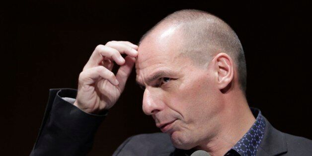 Greek Finance Minister Yanis Varoufakis gestures during his speech at a financial conference in Athens, on Tuesday, May 19, 2015. Market anxiety eased in Greece on Tuesday after the country's finance minister said he was confident of reaching a deal with bailout creditors as soon as next week. (AP Photo/Petros Giannakouris)