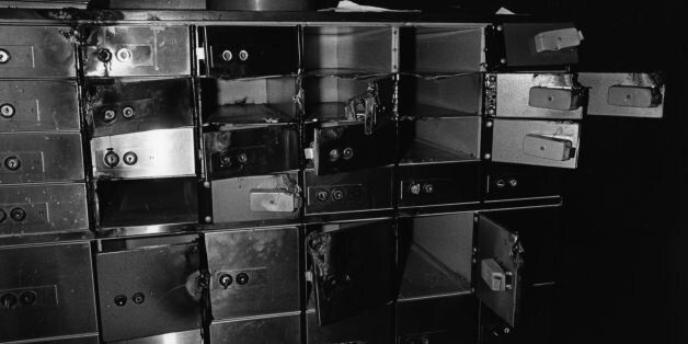 Damaged and empty safe deposit boxes following a robbery. (Photo by Evening Standard/Getty Images)