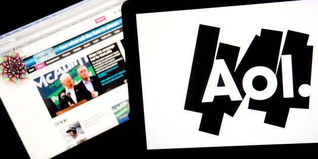 The Aol.com website and Aol Inc. logo are displayed on laptop computers arranged for a photograph in Washington, D.C., U.S., on Monday, Nov. 4, 2013. Aol Inc. is expected to release earnings data on Nov. 5. Photographer: Andrew Harrer/Bloomberg via Getty Images