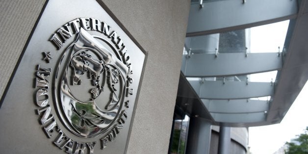 The logo of the International Monetary Fund(IMF) is seen shortly after Christine Lagarde, Managing Director, delivered remarks on the US economy during a press conference June 14, 2013 at IFM headquaraters in Washington, DC. AFP PHOTO/Paul J. Richards (Photo credit should read PAUL J. RICHARDS/AFP/Getty Images)