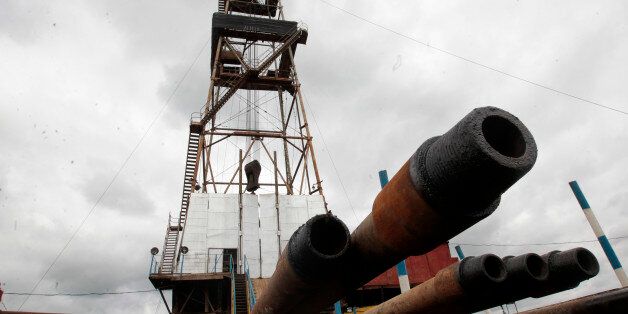 A drilling rig is seen near a gas condensate boosting compressor station ''East-Poltava'' near the village of Kovalivka, Poltava region some 357 kilometers of Kiev, Ukraine, Friday, June 27, 2014. Russia's state-controlled gas company, Gazprom, warned its European customers Friday that it could limit supplies to those European countries that intend to re-sell the natural gas on to Ukraine. (AP Photo/Sergei Chuzavkov)