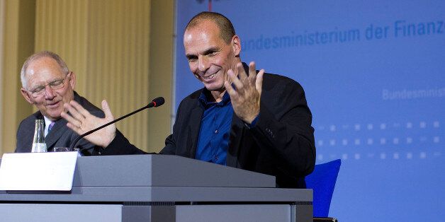 BERLIN, GERMANY - FEBRUARY 05: New Greek Finance Minister Yanis Varoufakis and German Finance Minister Wolfgang Schaeuble (L) speak to the media following talks on February 5, 2015 in Berlin, Germany. Varoufakis is touring several European cities and yesterday met with Mario Draghi at the European Central Bank following announcements by the new Greek government to sharply alter its relationship with the troika of loan-giving entities. (Photo by Carsten Koall/Getty Images)