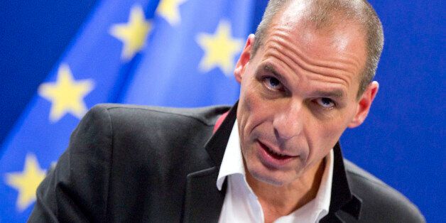 Greek Finance Minister Yanis Varoufakis speaks during a media conference after a meeting of eurogroup finance ministers in Brussels on Friday, Feb. 20, 2015. Eurozone finance ministers meet for a crucial day of talks Friday to see whether a Greek debt relief proposal is acceptable to Germany and other nations using the common currency. (AP Photo/Virginia Mayo)