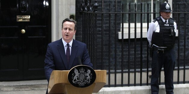 Britain's Prime Minister David Cameron speaks to the media in 10 Downing Street in London Friday, May 8, 2015. Cameron's Conservative Party swept to power Friday in Britain's Parliamentary elections winning an unexpected majority. (AP Photo/Alastair Grant )