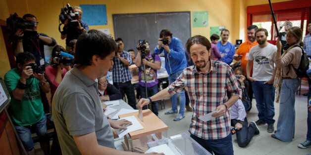 MADRID, SPAIN - MAY 24: 'Podemos' leader Pablo Iglesias poses for a picture as he casts his votes at a polling station on May 24, 2015 in Madrid, Spain. Spaniards are going to the polls today to vote for mayors and presidents of regional government where new political parties such as 'Podemos' (We Can) and 'Ciudadanos' (Citizens) will face their first test across the country ahead of General Elections by the end of November. (Photo by Pablo Blazquez Dominguez/Getty Images)