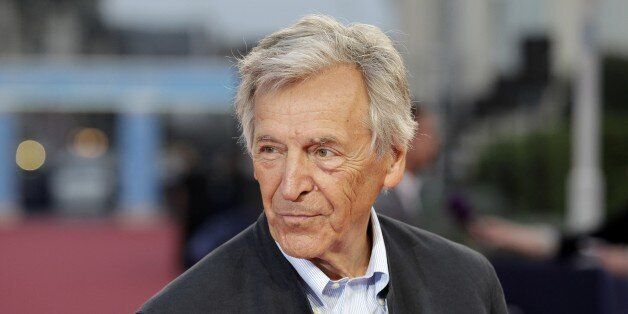 Greek-French film director Costa-Gavras poses on the red carpet before the screening of the movie 'Camp X-Ray' premiere on September 8, 2014 in the French northwestern sea resort of Deauville, during the 40th Deauville US Film Festival. AFP PHOTO/CHARLY TRIBALLEAU. (Photo credit should read CHARLY TRIBALLEAU/AFP/Getty Images)