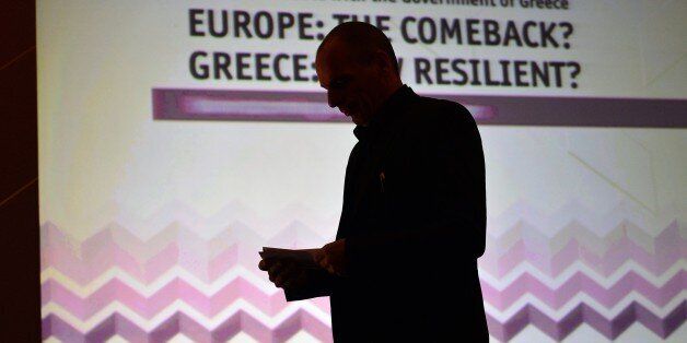 Greek finance minister Yianis Varoufakis stands prior to deliver a speech during the Economist conference entitled 'Europe: The comeback ? Greece: How resilient?' on May 14, 2015 in Athens. Greece wants the European Central Bank to agree for Athens to delay payment on some 27 billion euros ($30 billion) in Greek bonds that it will otherwise be unable to repay, the finance minister said . AFP PHOTO/ LOUISA GOULIAMAKI (Photo credit should read LOUISA GOULIAMAKI/AFP/Getty Images)
